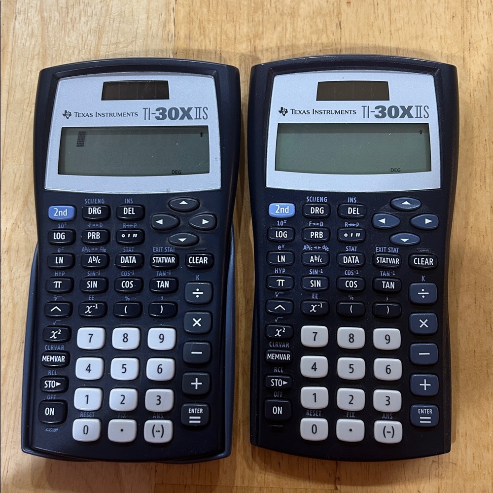 Two Texas Instruments TI-30XIIS solar powered Scientific Calculators